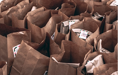 Brown paper bags with clothing donations